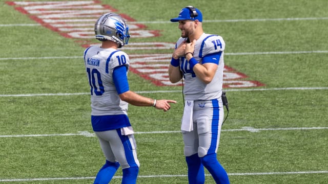 Apr 2, 2023; Houston, TX, USA; Louis Battlehawks quarterback A.J. McCarron (10) talks with quarterback Nick Tianon (14) during a Houston Roughnecks timeout in the fourth quarter at TDECU Stadium. Mandatory Credit: Thomas Shea-USA TODAY Sports  